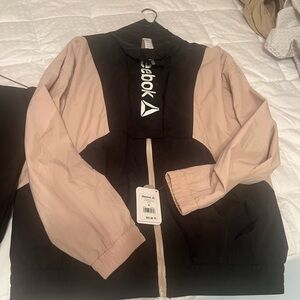 Reebok track suit XL.